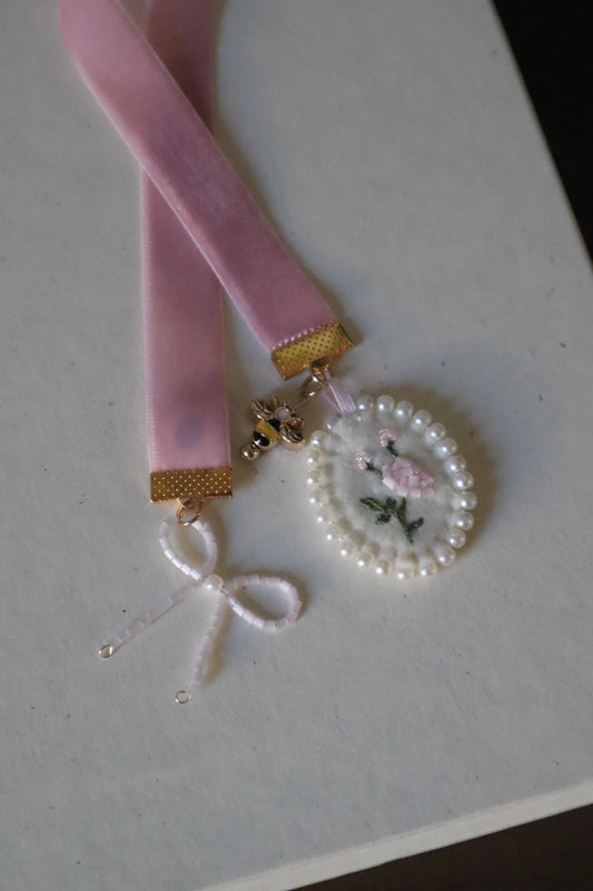 The inventor embroidered bookmark