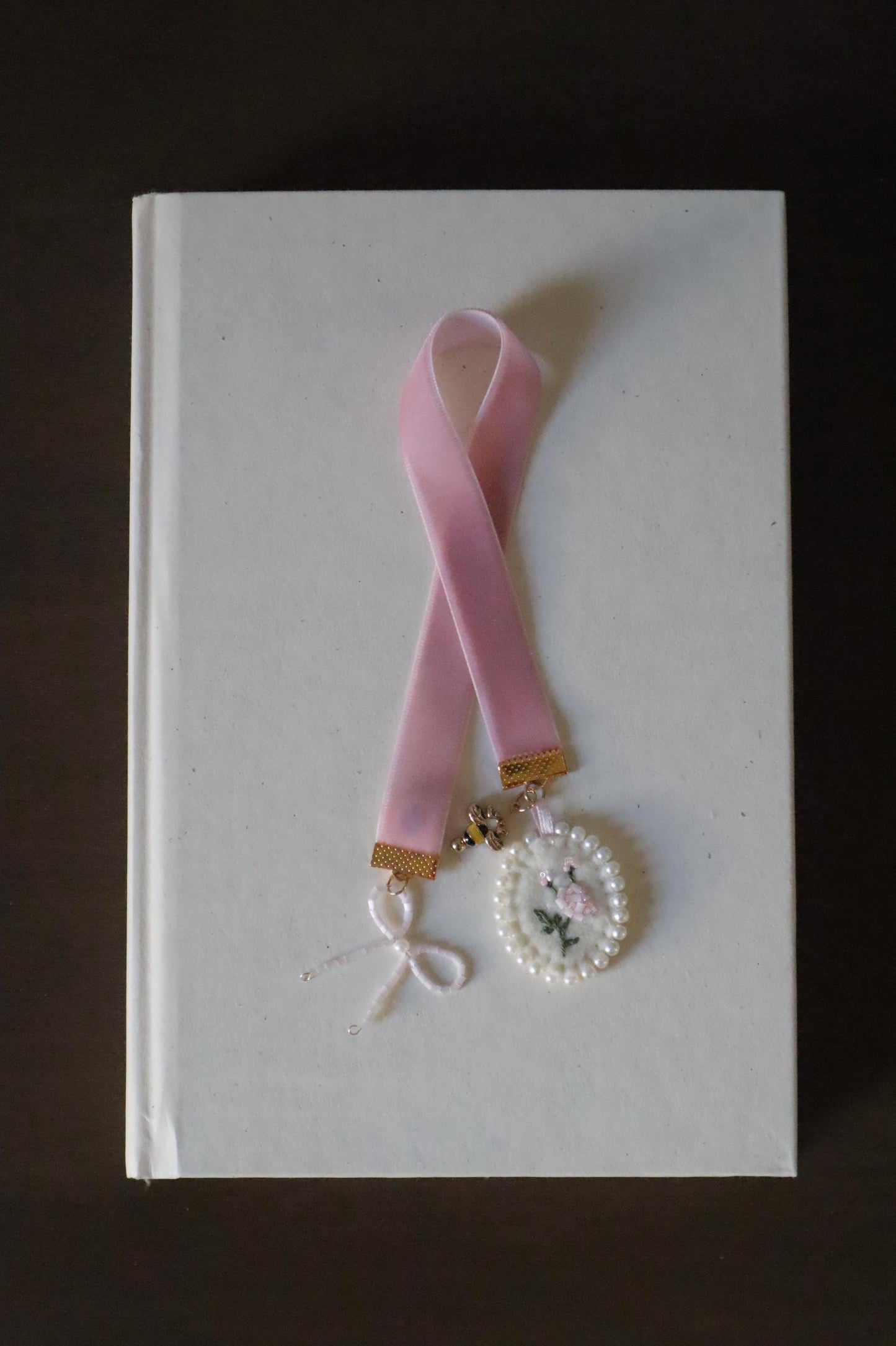 The inventor embroidered bookmark